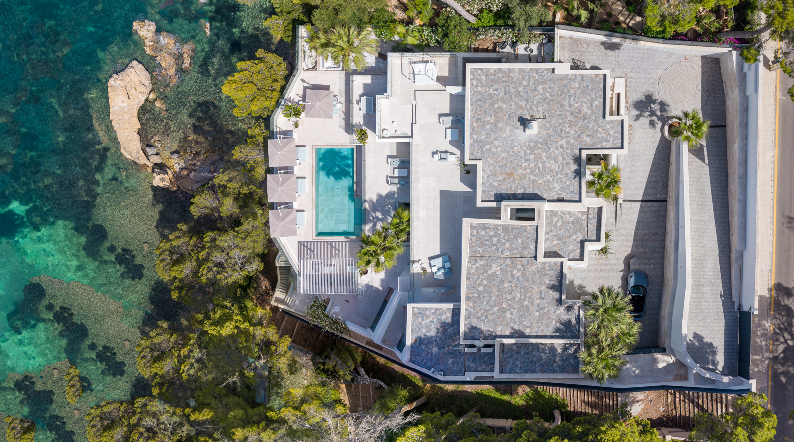Modern new construction villa in first sea line with private sea access in Cala Vinyes (19)